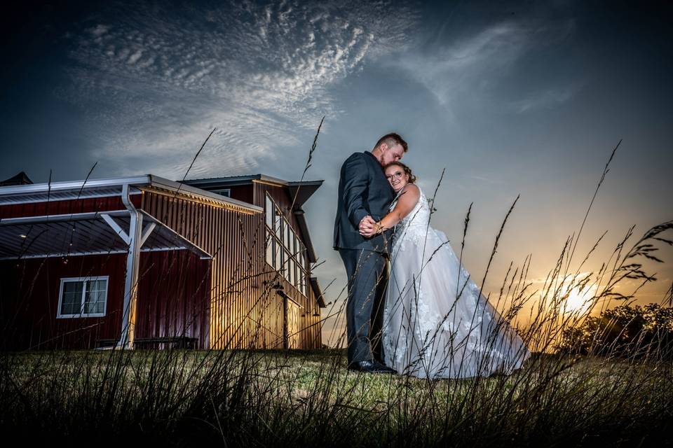 Barn wedding sunset
