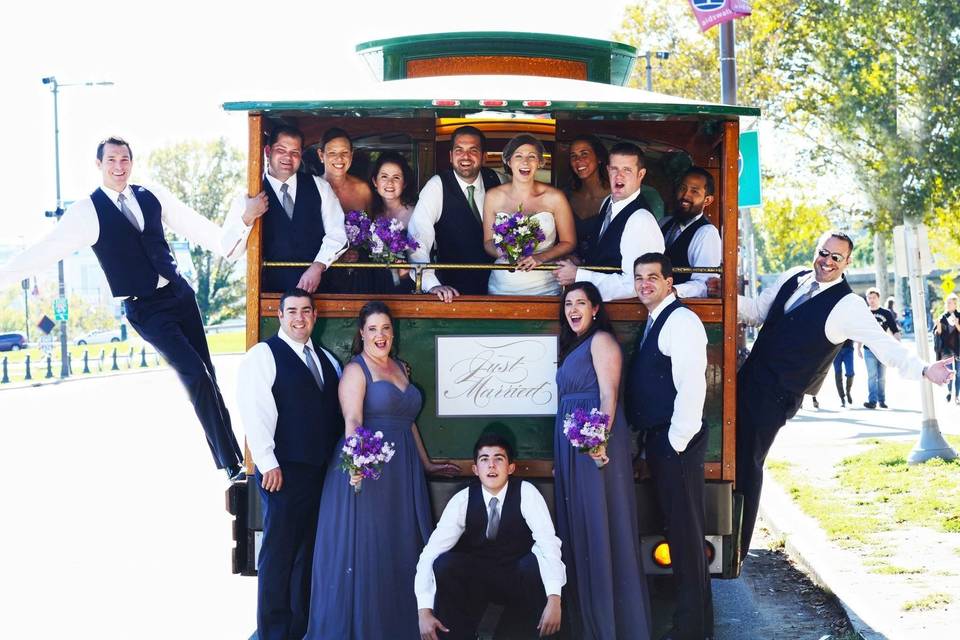 The newlyweds with the wedding attendants