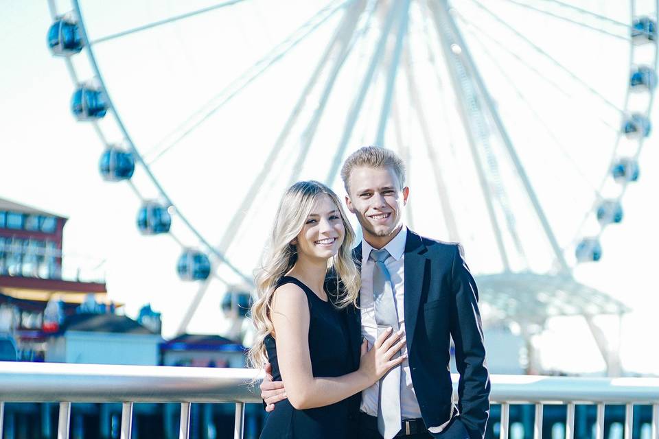 Artem and Christina in front of the Seattle farris wheel.