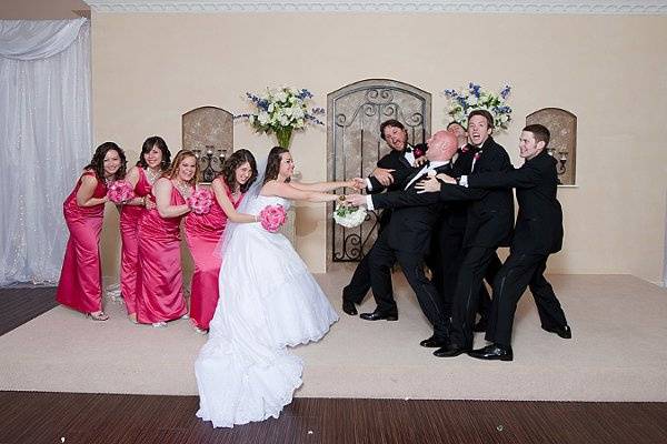 Taking fun photos is a great way to remember your wedding party.