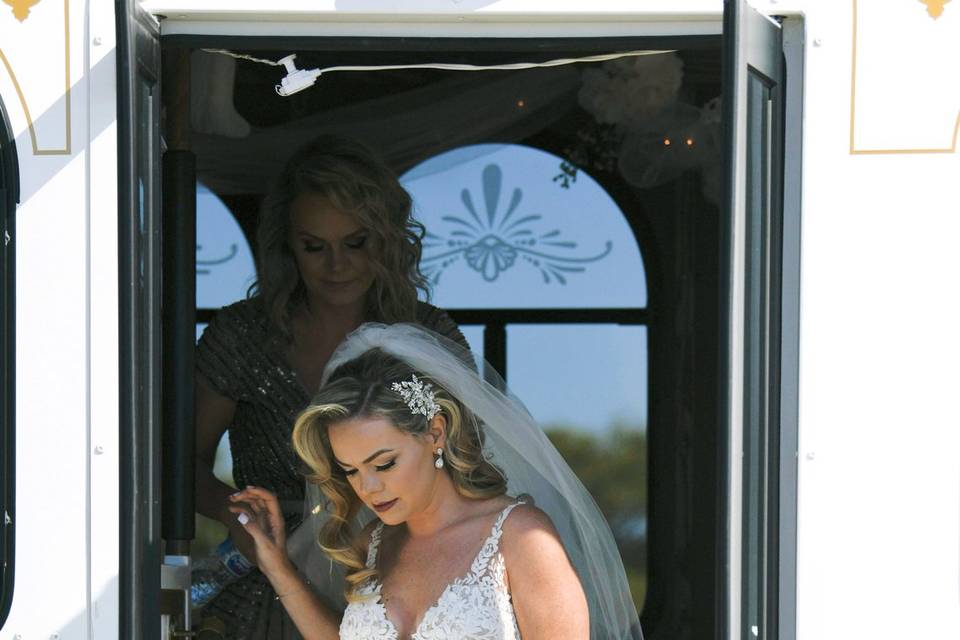 Bride exiting trolley