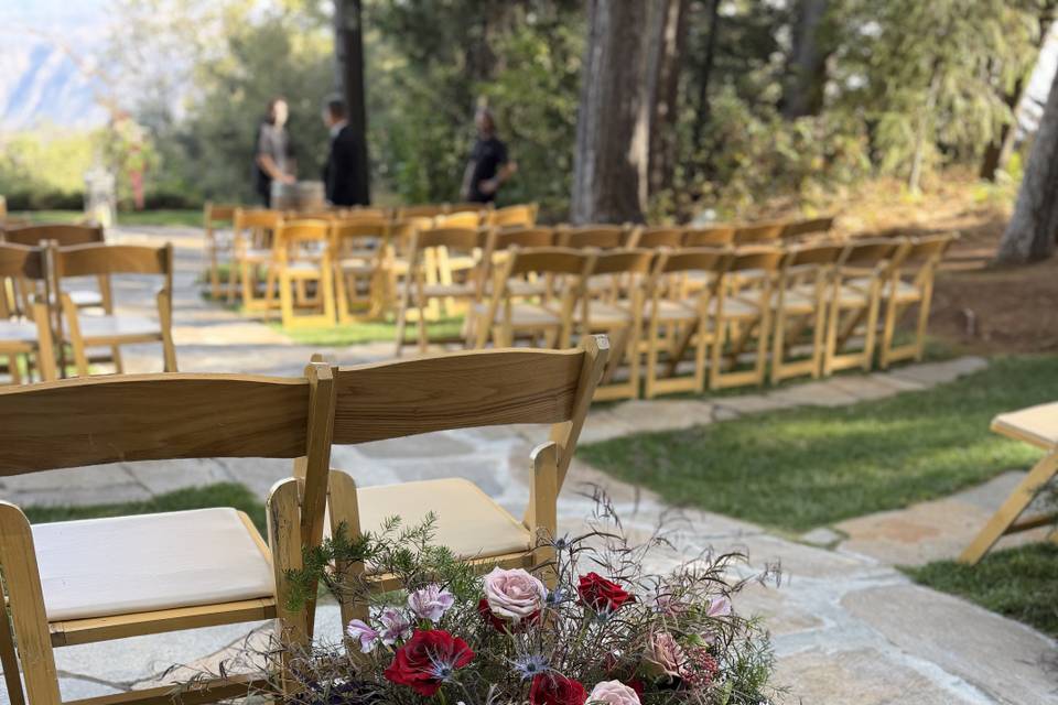 Garden-style aisle flowers wit