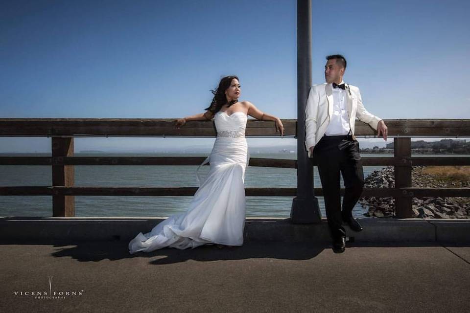 Bride and groom by the beach