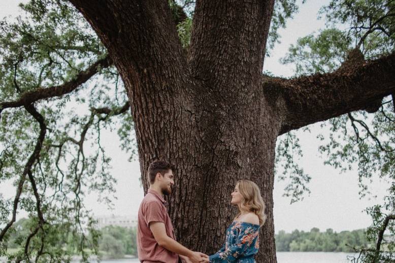 Couple beside a tree