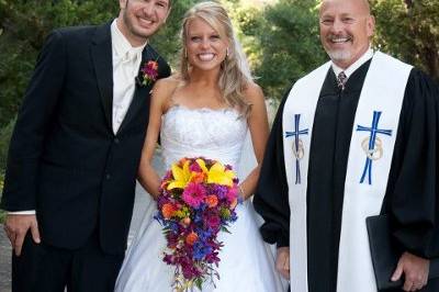 The officiant and the newlyweds