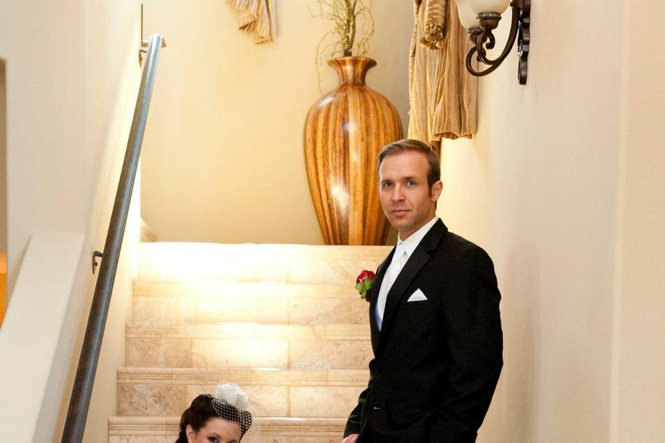 Posing by the staircase