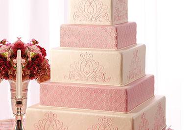 Pink and white square wedding cake