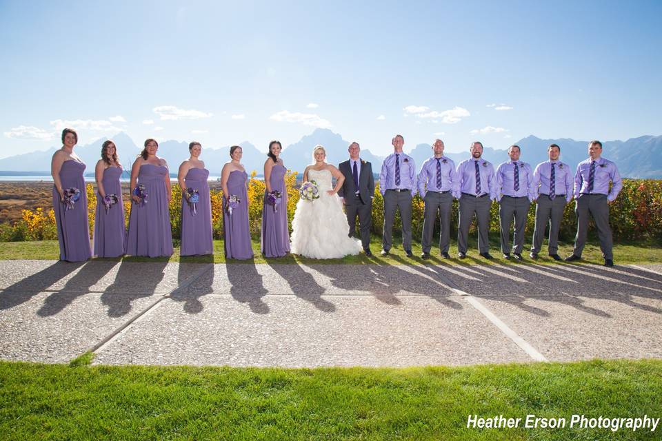 The couple with bridesmaid and groomsmen