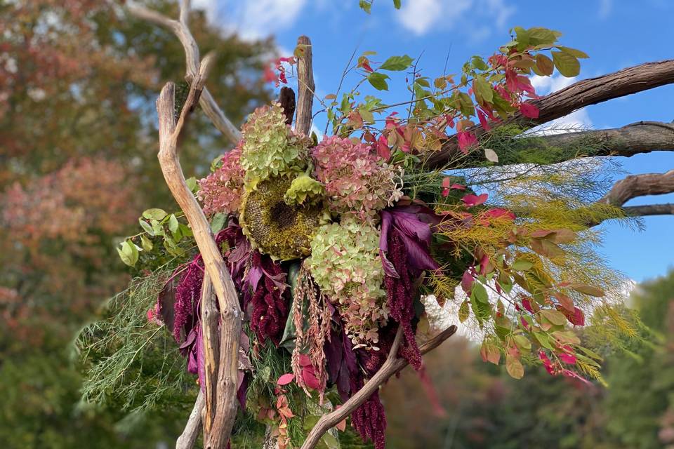 Flowers on wedding arch