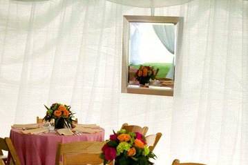 Pink tables and wooden chairs