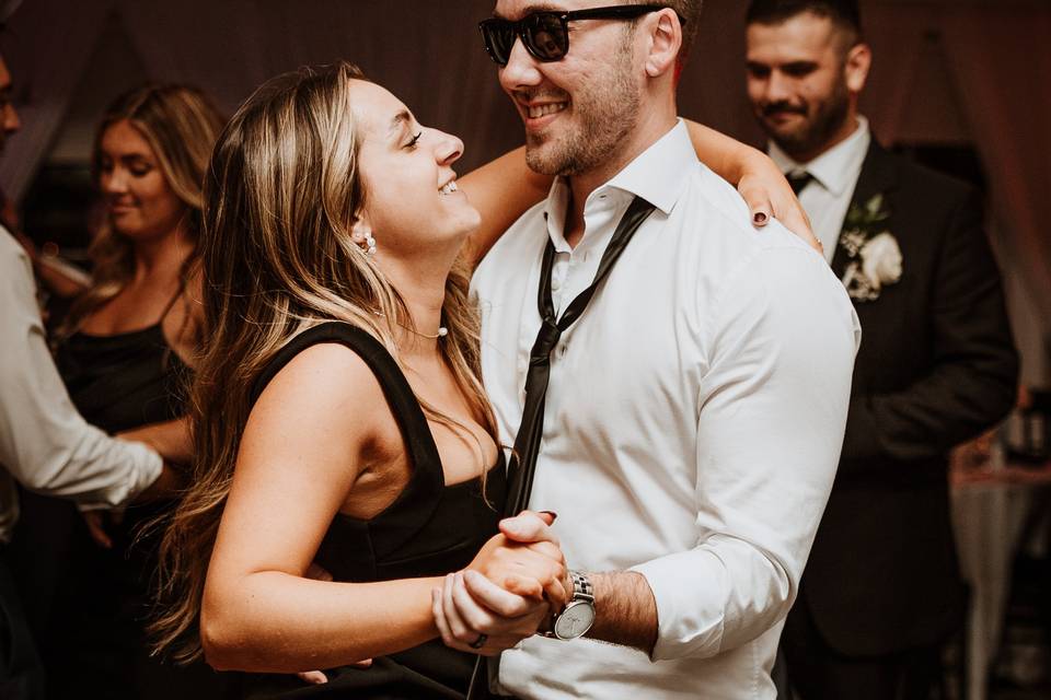 Bridesmaid groomsman dancing