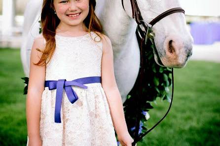 Flower girl and the pony