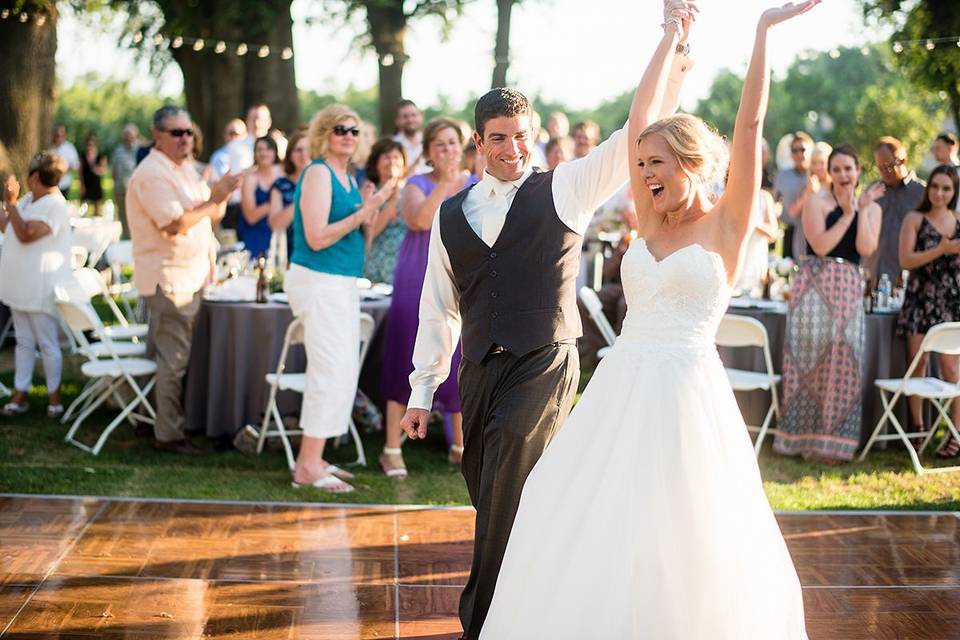 Introducing the new Mrs. & Mr.Photo by - Third Element Photo + CinemaWedding Coordinator - The Social SpreeRentals - Expo Party RentalsLighting - Light Up The WallsDJ/Emcee - AMS Entertainment