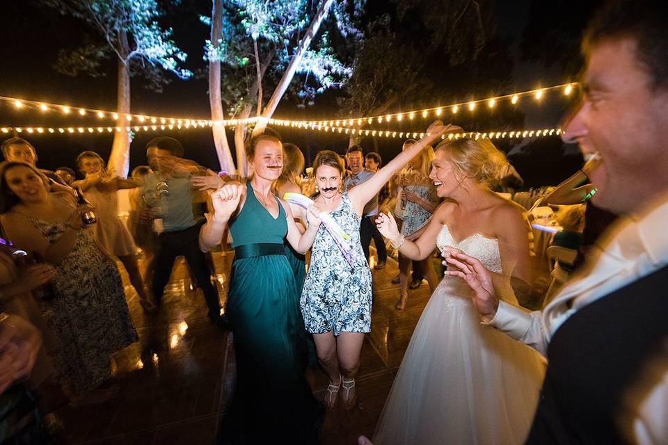 Photo by - Third Element Photo + CinemaWedding Coordinator - The Social SpreeRentals - Expo Party RentalsLighting - Light Up The WallsDJ/Emcee - AMS Entertainment