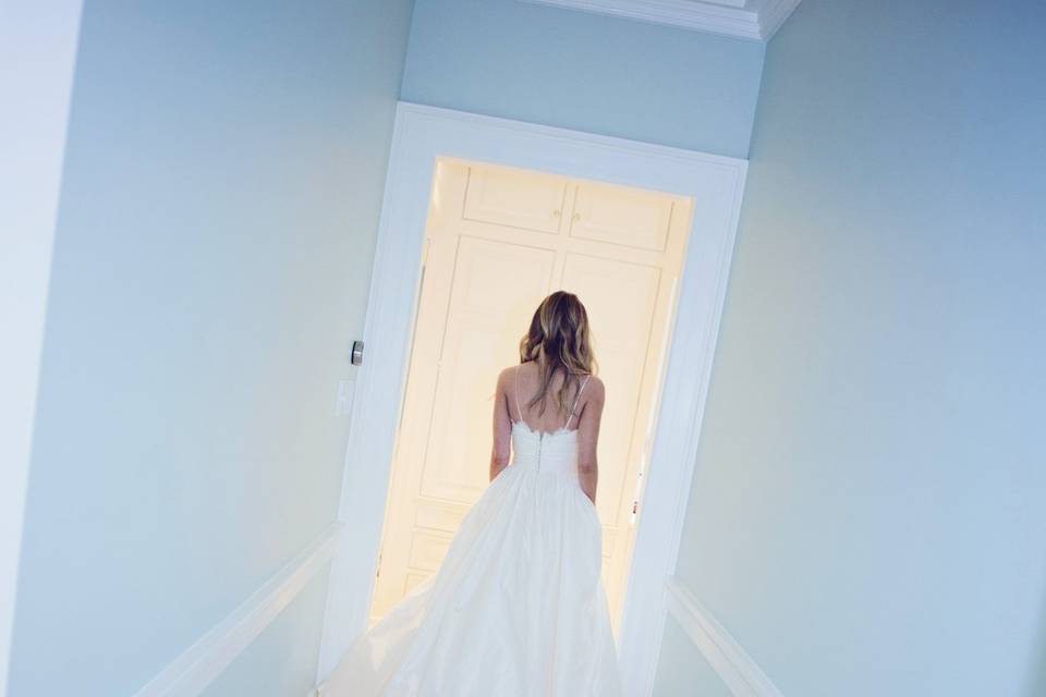 Bride walking down hallway