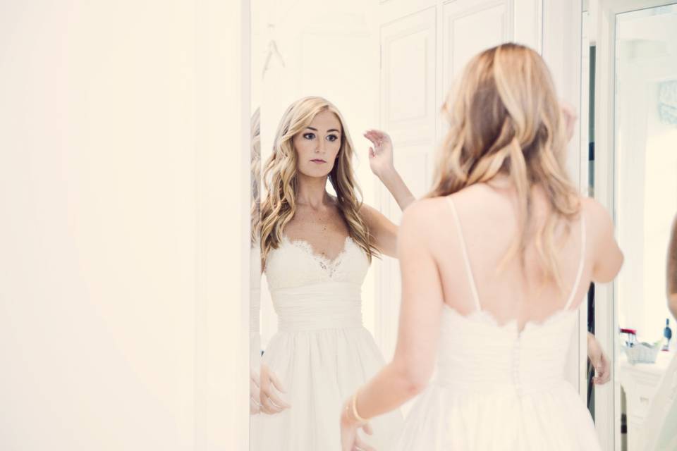 Bride looking in the mirror