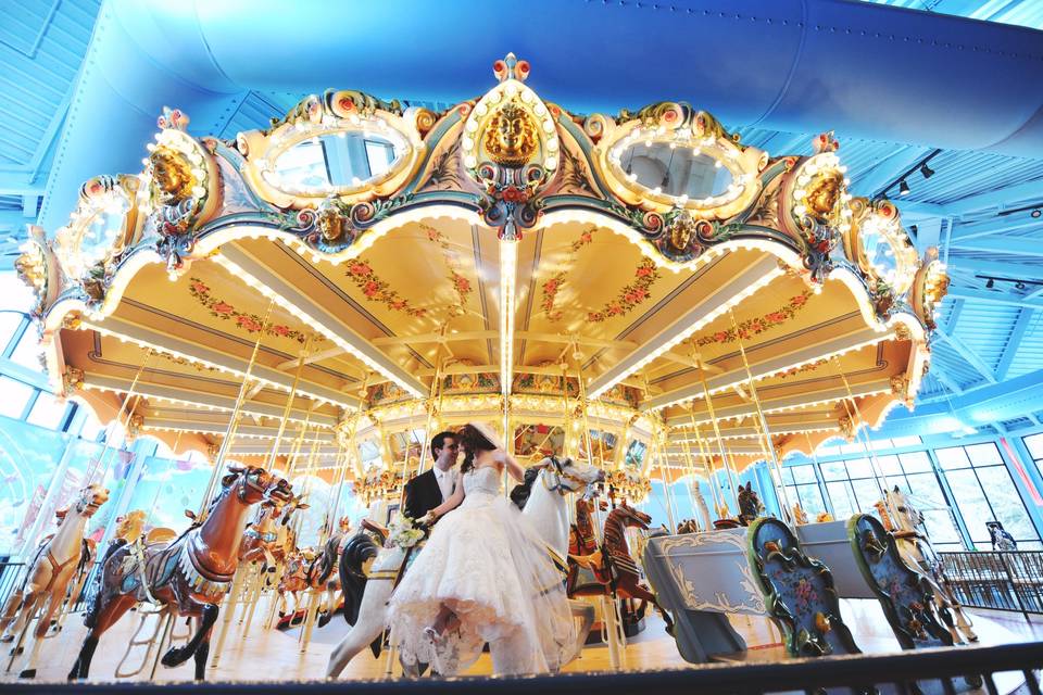 Bride and groom on the carousel
