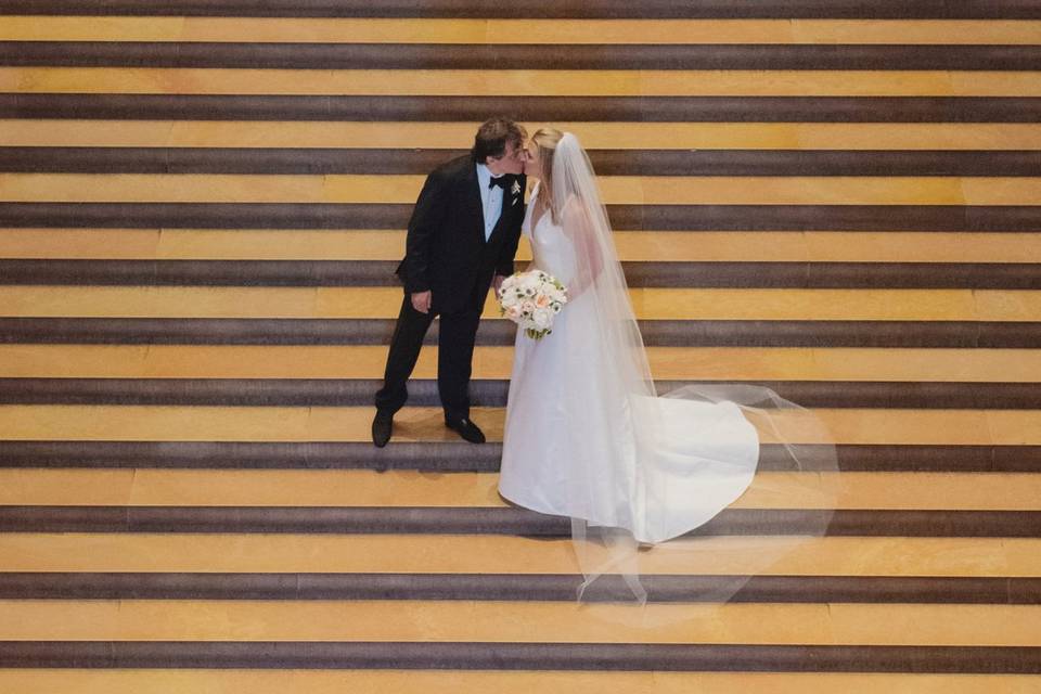 Groom and bride at the art museum stairs