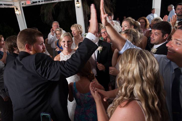 The couple and guests dancing