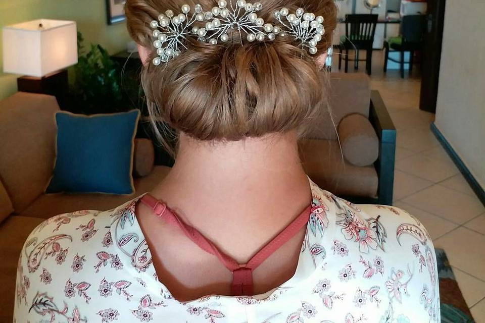 Updo with small flower hairpins