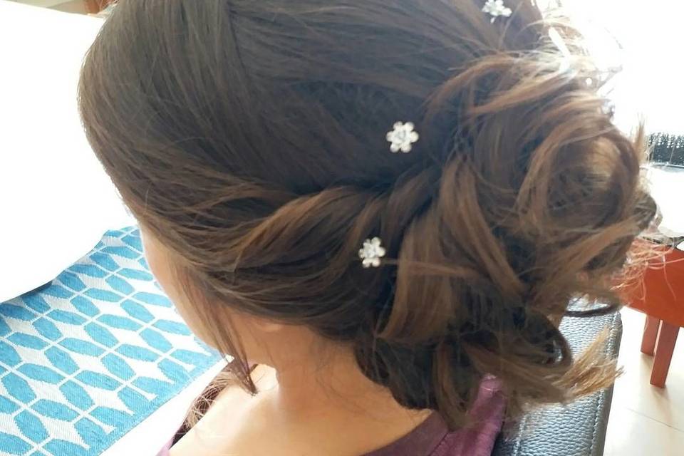 Updo with small flower hairpins