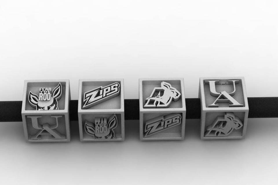 As some of you may know we are the official jewelers of the Akron Zips which is why we carry beads thay fit on the chamilia and pandora bracelet. The one shown in this picture is of the cube a four sided bead showing varients of zippy and the University of Akron logo.