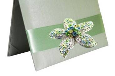 Silk Folio Invitation adorned with Starfish Brooch that is encrusted with turquoise, green and faux diamonds.  Unique for any Spring or Summer Wedding Invitation.