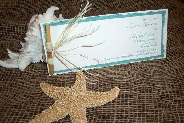 Bamboo Save the Date with handmade paper and raffia tie embellishment that is perfect for a destination or beach wedding.