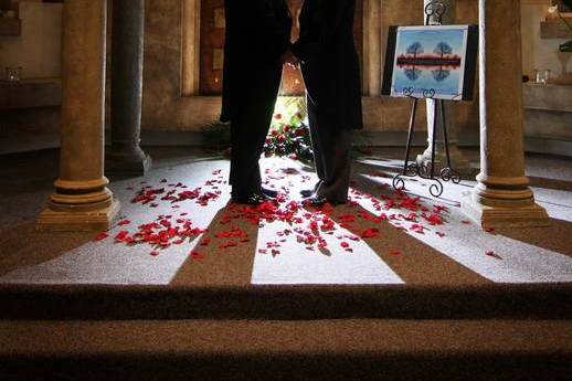 Under the wedding arbor