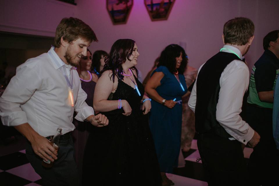 Bride dancing with friends