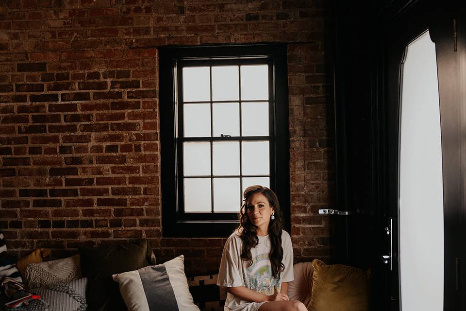 Bride getting ready in suite