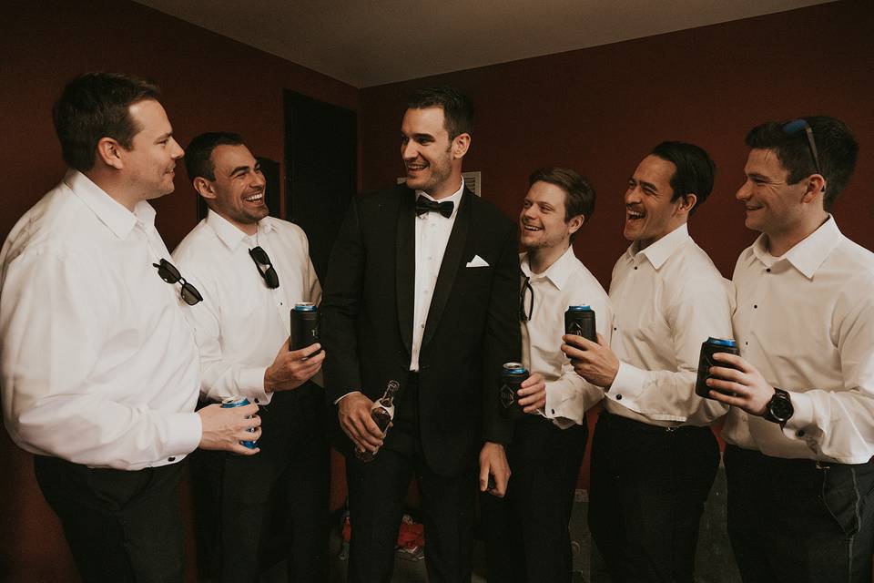 Groom and groomsmen in suite