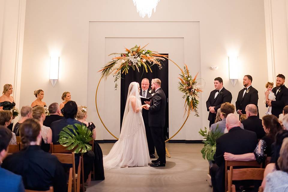 NYE couple at altar