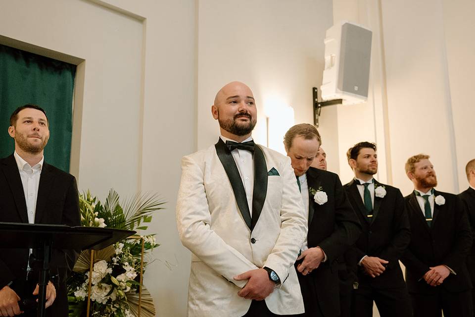 Groom emotional seeing bride