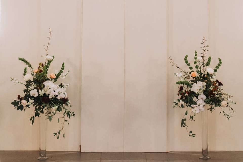 Vow renewal backdrop florals