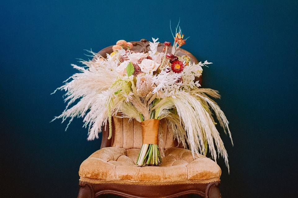 Bouquet in vintage chair