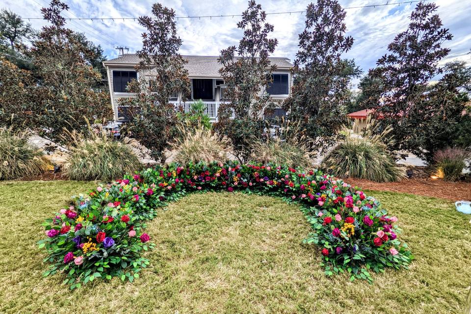 Floral ground arch in jewel to