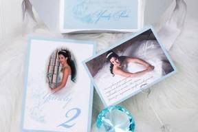 Custom designed ribbon-tie pochette for a Cinderella themed Fifteenth Birthday/Quince celebration. Three Swarovski crystals were precisely glued to accent the castle illustration on the vellum overlay. Matching photo table numbers and thank you cards complimented the suite.