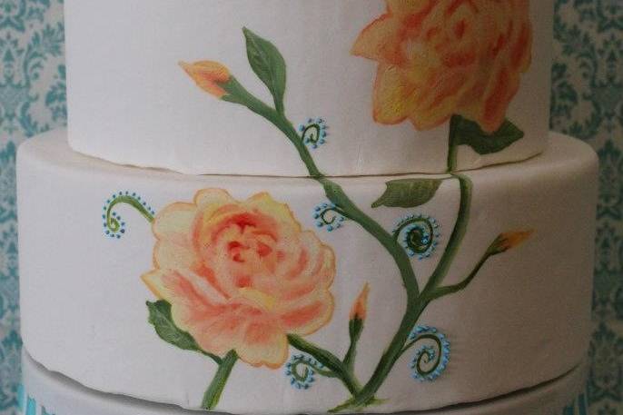 HAndmade Sugar Love Birds top a Hand Painted Flower Cake
