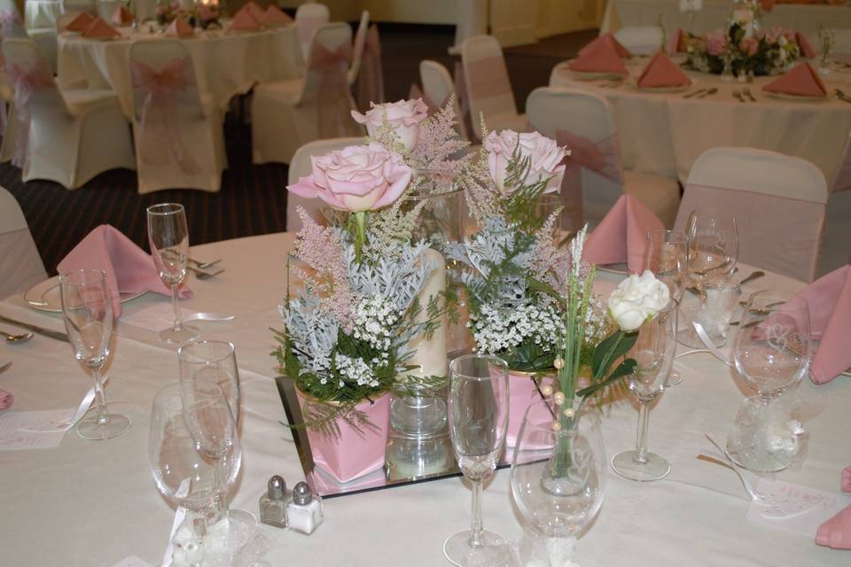 Pink mini vase wedding tables