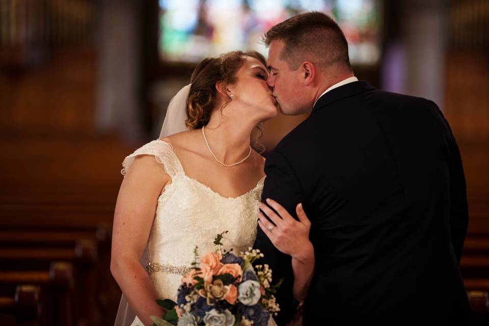 Couple kissing in church