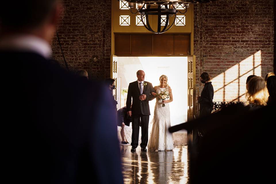 Bride coming down aisle