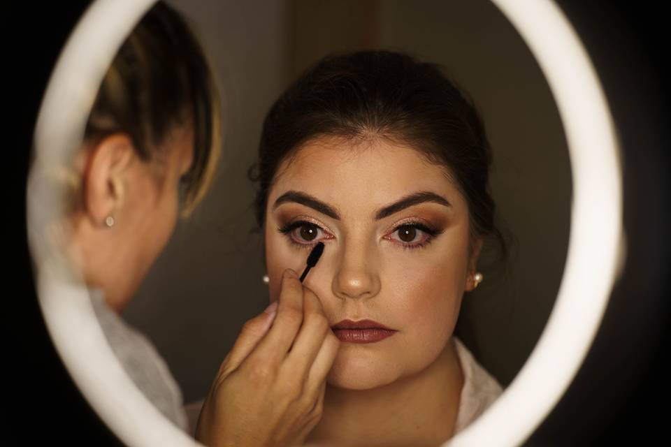 Bride getting makeup