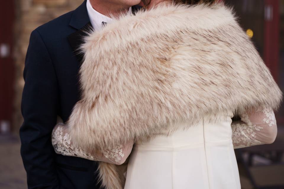 Bride kissing Groom