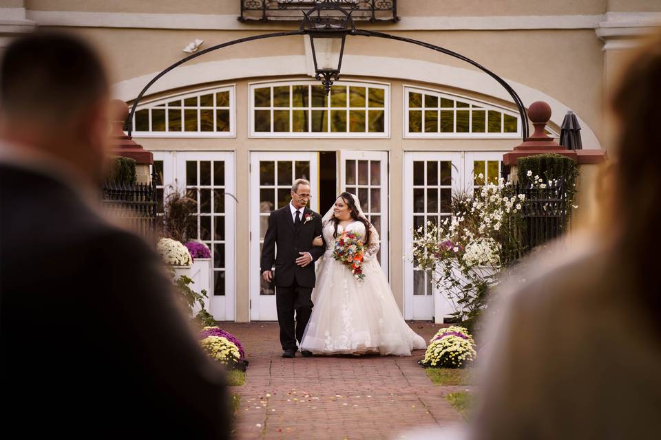 Bride coming down aisle