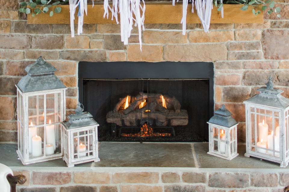 Loving this fun ribbon and hoop centerpiece for the fireplace.  The lanterns add a wonderful touch as well