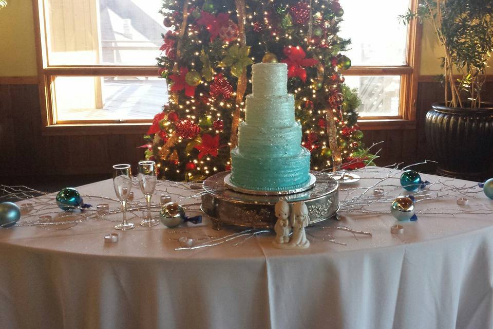 This bride loved ombre style and the color teal to adorn her vanilla and vanilla italian buttercream wedding cake.