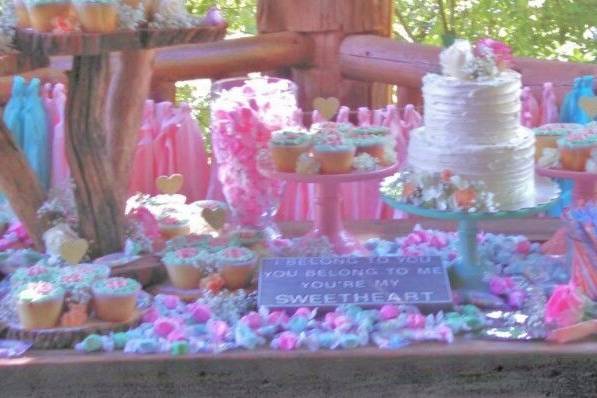 A cake, cupcake and candy table? Sure! Why not?