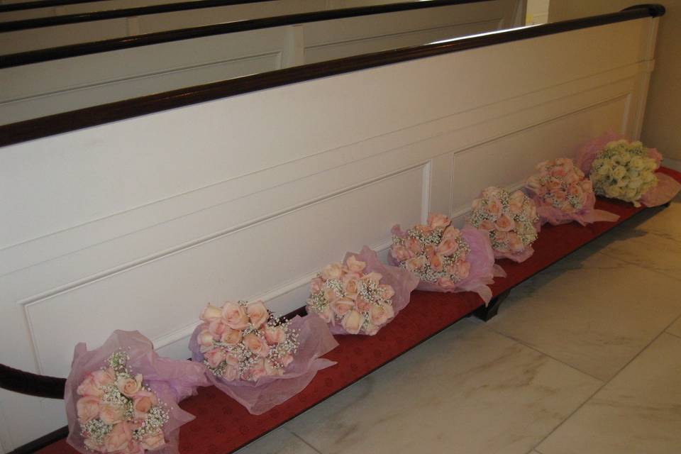 Bouquets are lined up waiting to be handed out.
