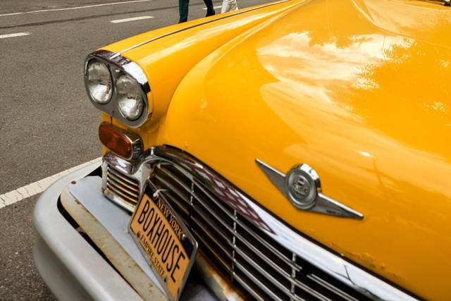 Couple by a taxi